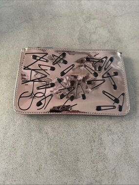 NARS  Metallic Safety Pin cosmetic pouch.